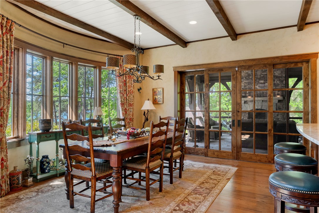 104 Crooked Stick Court Sunset, SC 29685 - Photo 6 of 43 This dining room offers captivating views and direct access to an inviting outdoor space.