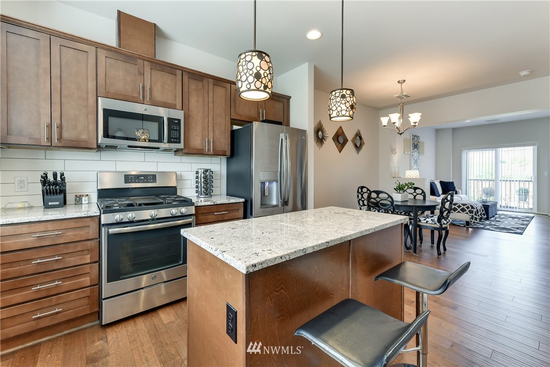 3337 30th Drive Everett, WA 98201 - Photo 16 of 28 a view of kitchen with sink microwave and stove