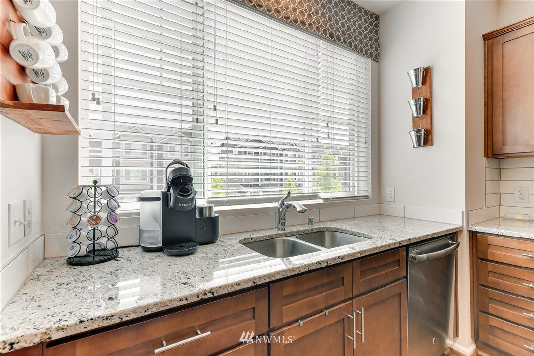 3337 30th Drive Everett, WA 98201 - Photo 19 of 28 a kitchen with a sink and a window