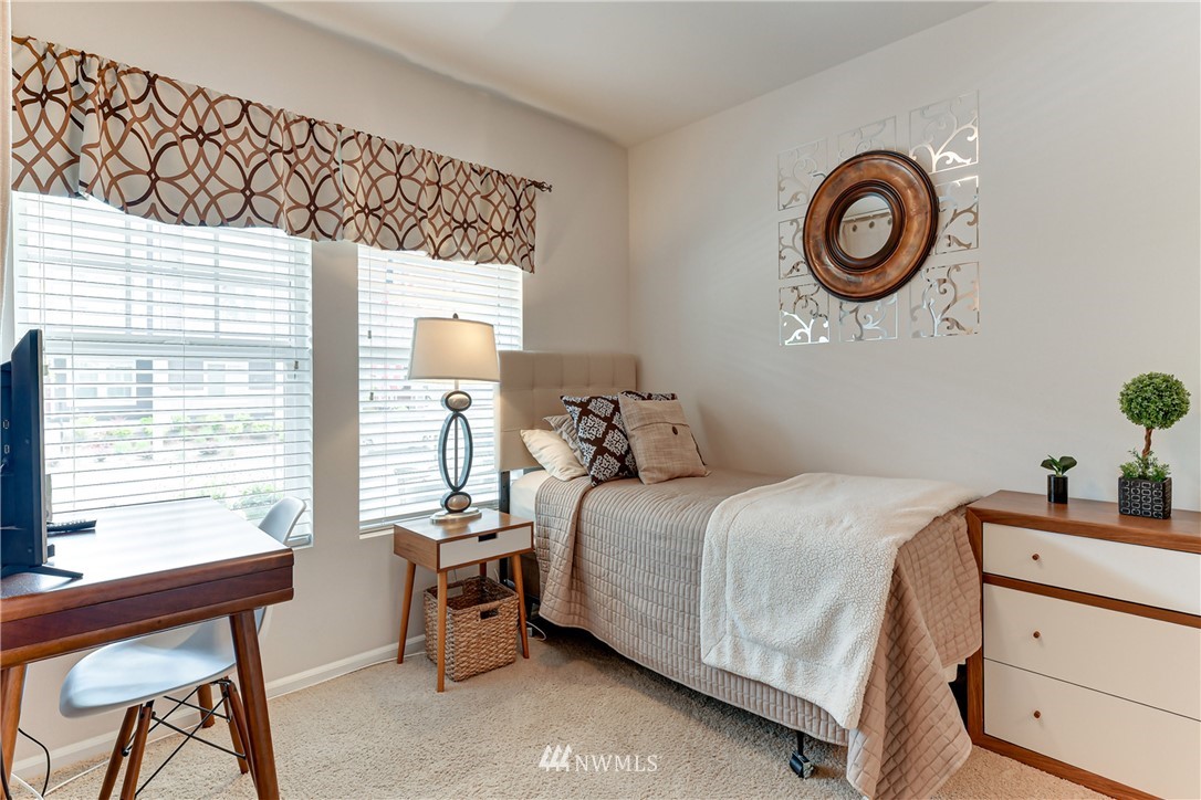 3337 30th Drive Everett, WA 98201 - Photo 7 of 28 a bedroom with a bed and a window
