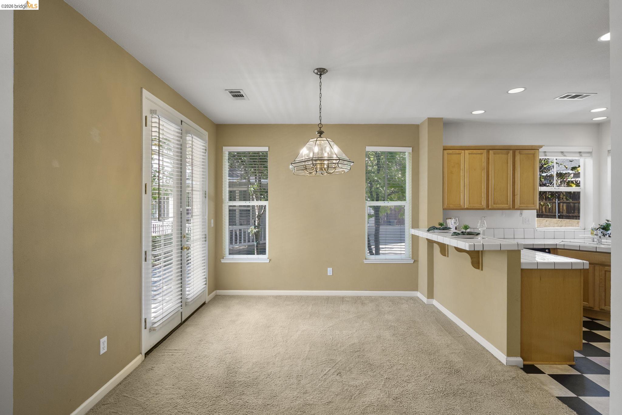 343 Field Stone Drive Murphys, CA 95247 - Photo 12 of 40 a view of an empty room with window and cabinet