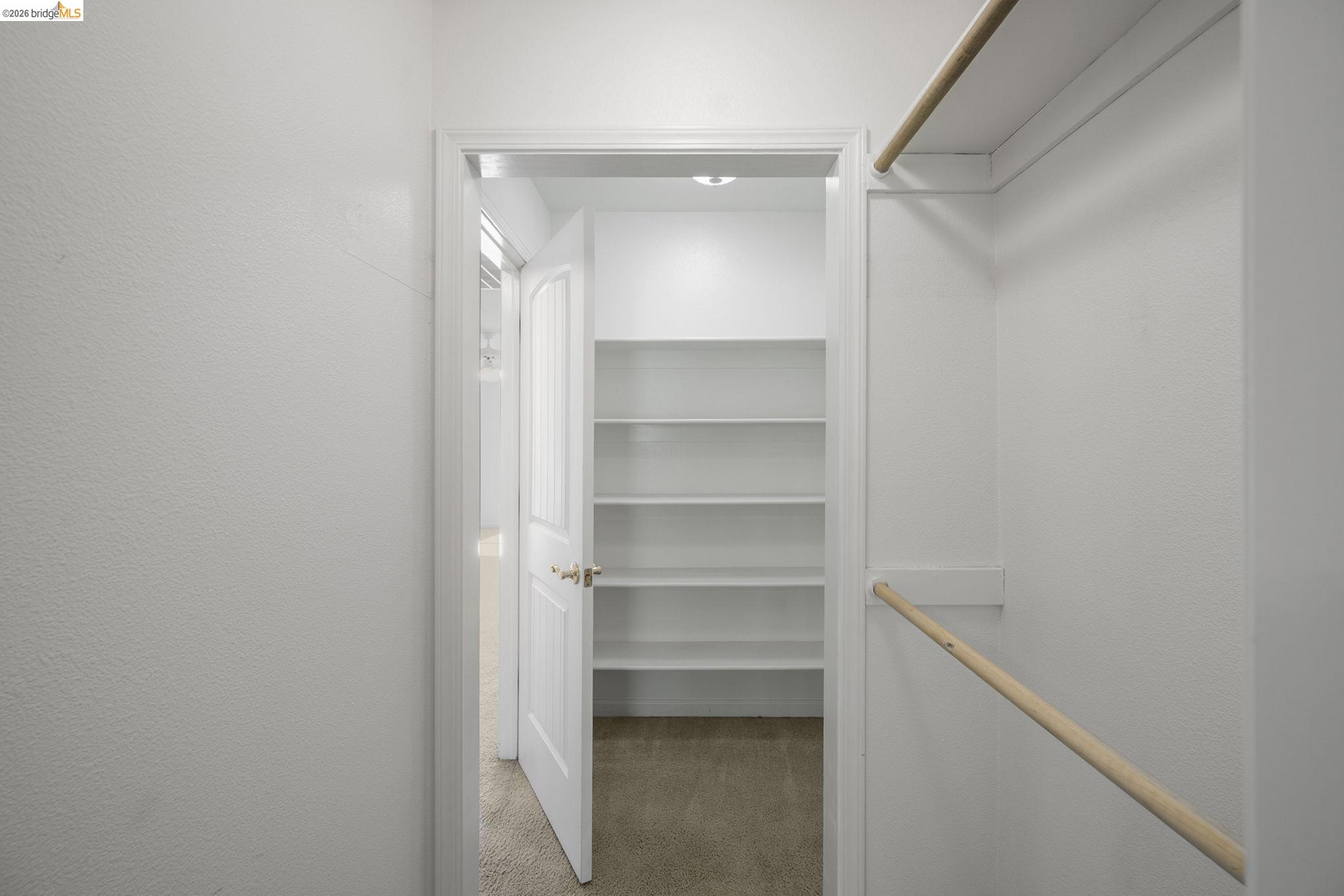 343 Field Stone Drive Murphys, CA 95247 - Photo 30 of 40 a room with walk in closet with empty racks