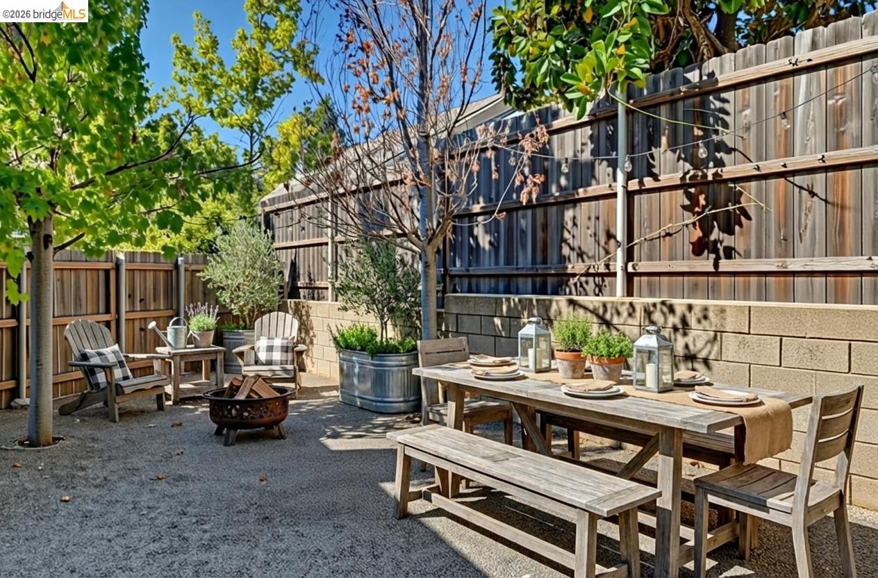 343 Field Stone Drive Murphys, CA 95247 - Photo 33 of 40 a view of a patio with table and chairs and potted plants