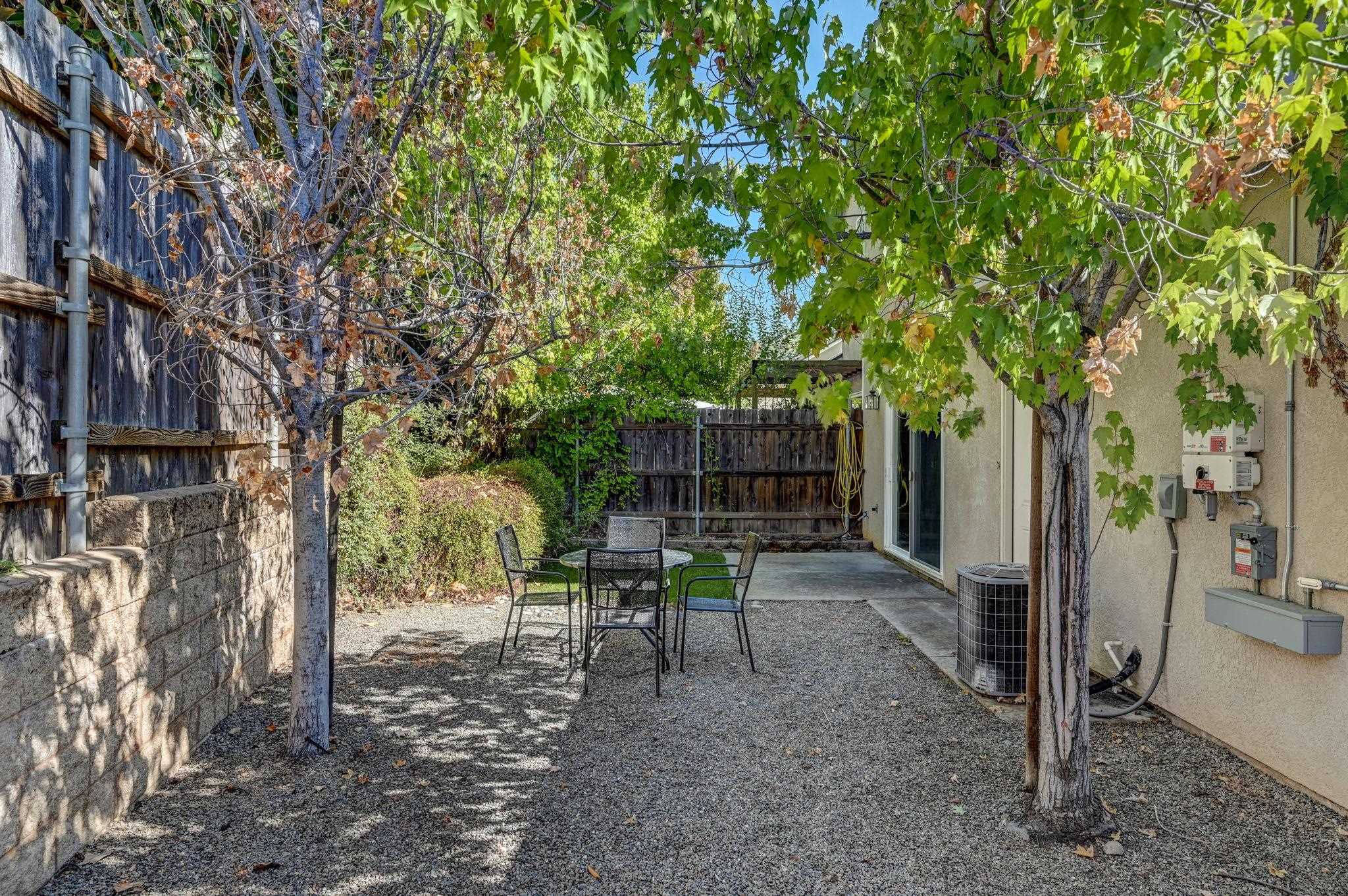 343 Field Stone Drive Murphys, CA 95247 - Photo 36 of 40 Fenced backyard with trees