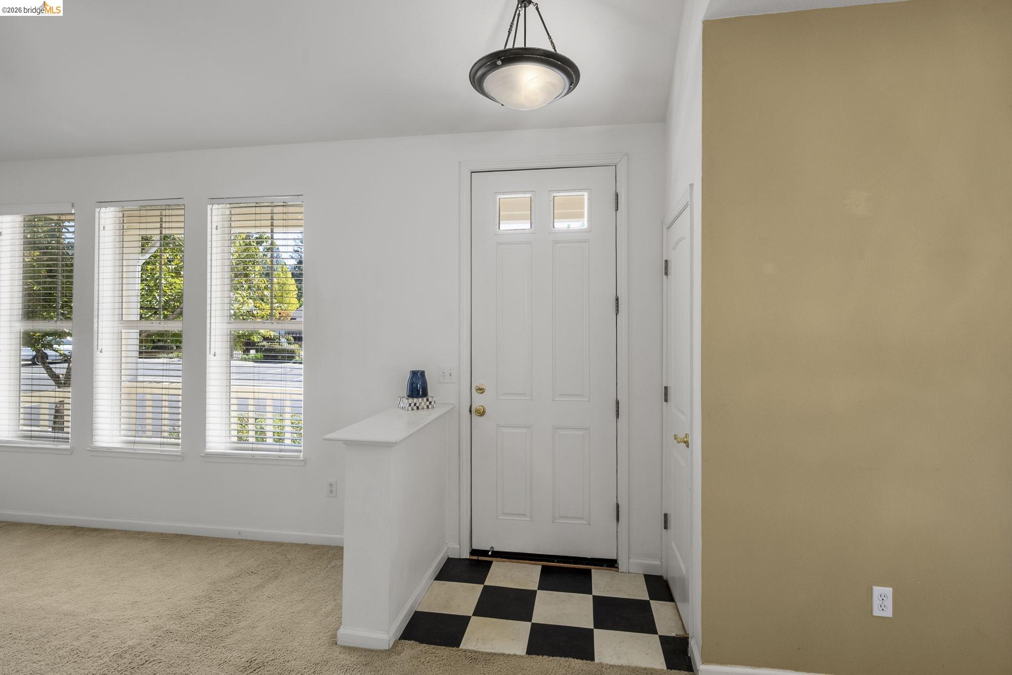 343 Field Stone Drive Murphys, CA 95247 - Photo 7 of 40 a view of a room with windows and white walls