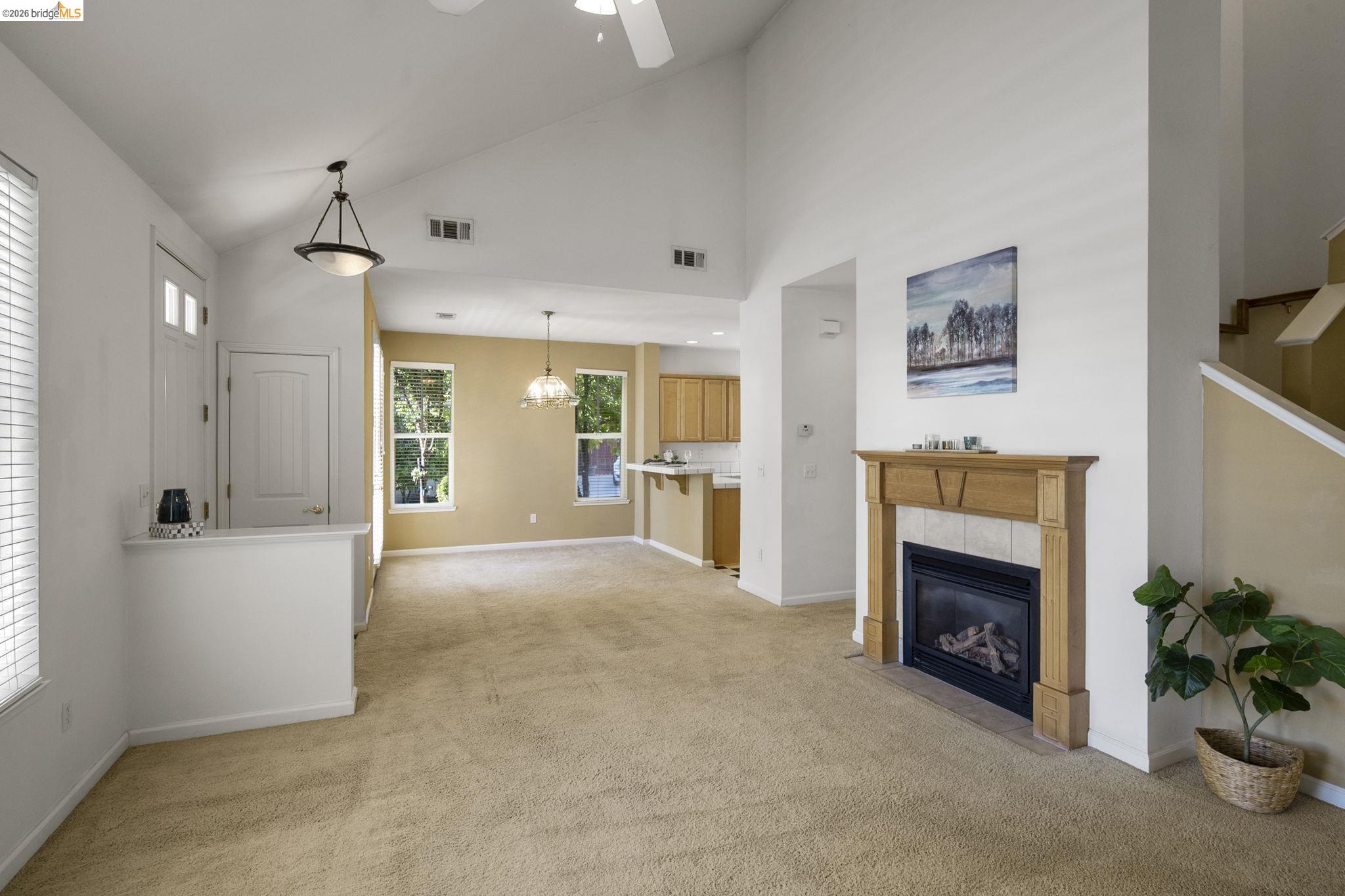343 Field Stone Drive Murphys, CA 95247 - Photo 10 of 40 a view of a livingroom with an empty space and a fireplace