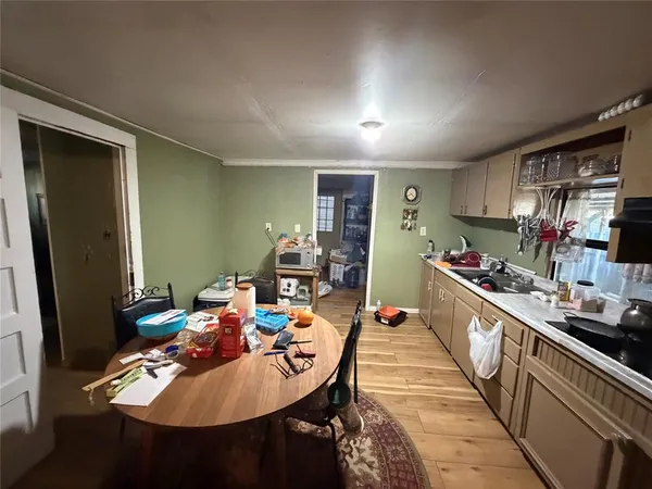 a very nice looking dining room with kitchen island