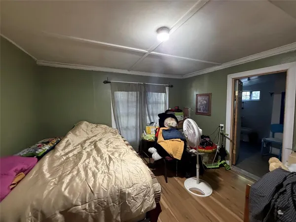 a bed room with a bed and furniture