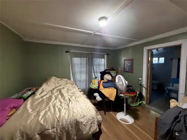 a bed room with a bed and furniture