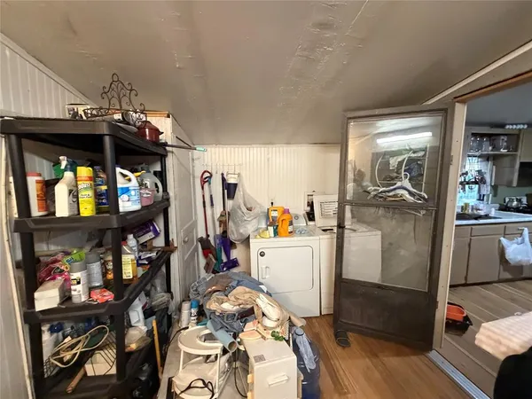 a view of a living room and dining room