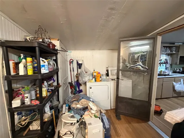 a view of a living room and dining room