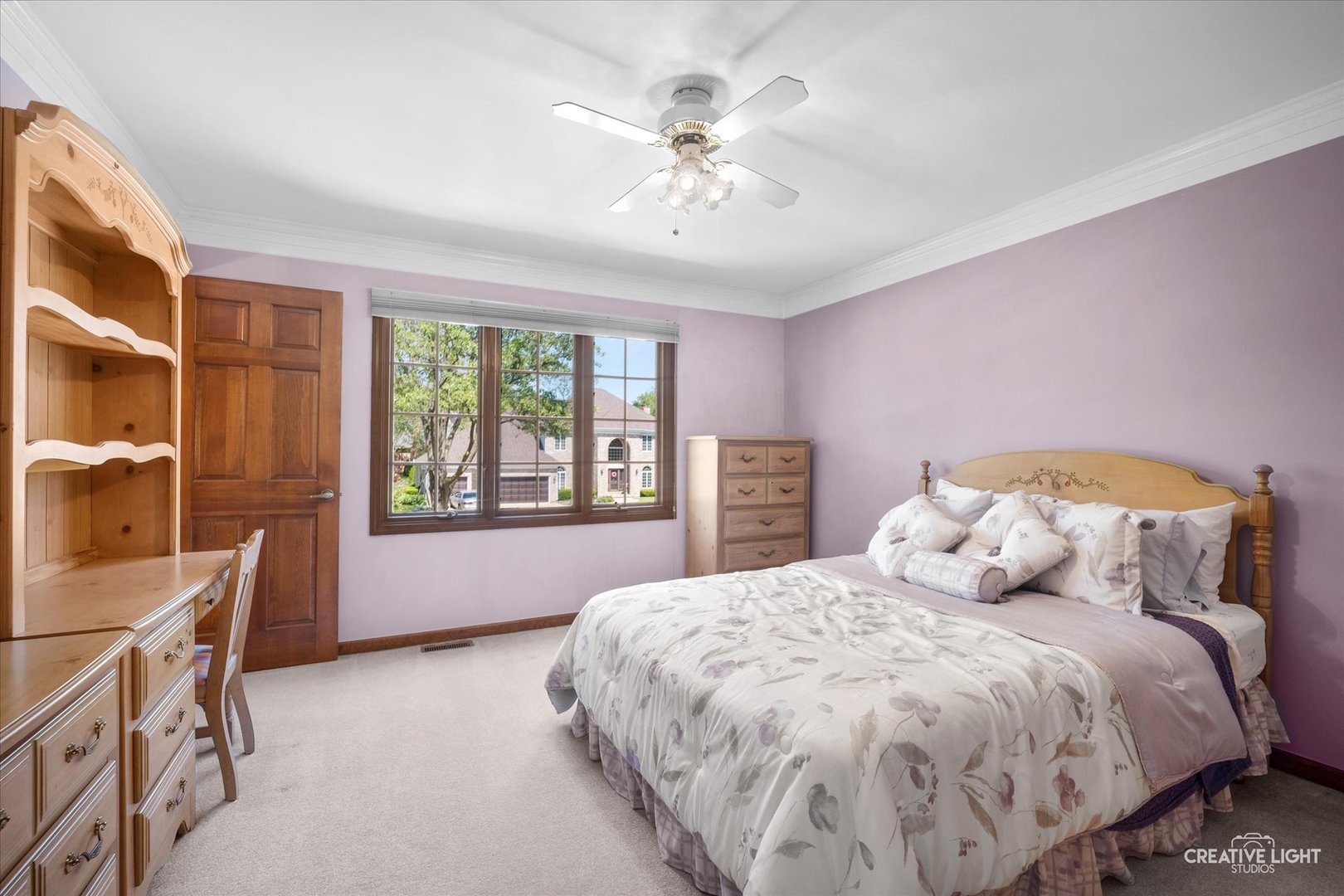 3112 Turnberry Road St. Charles, IL 60174 - Photo 29 of 43 a bedroom with a large bed and a window