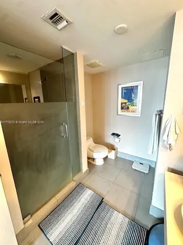 a view of a bathroom with toilet