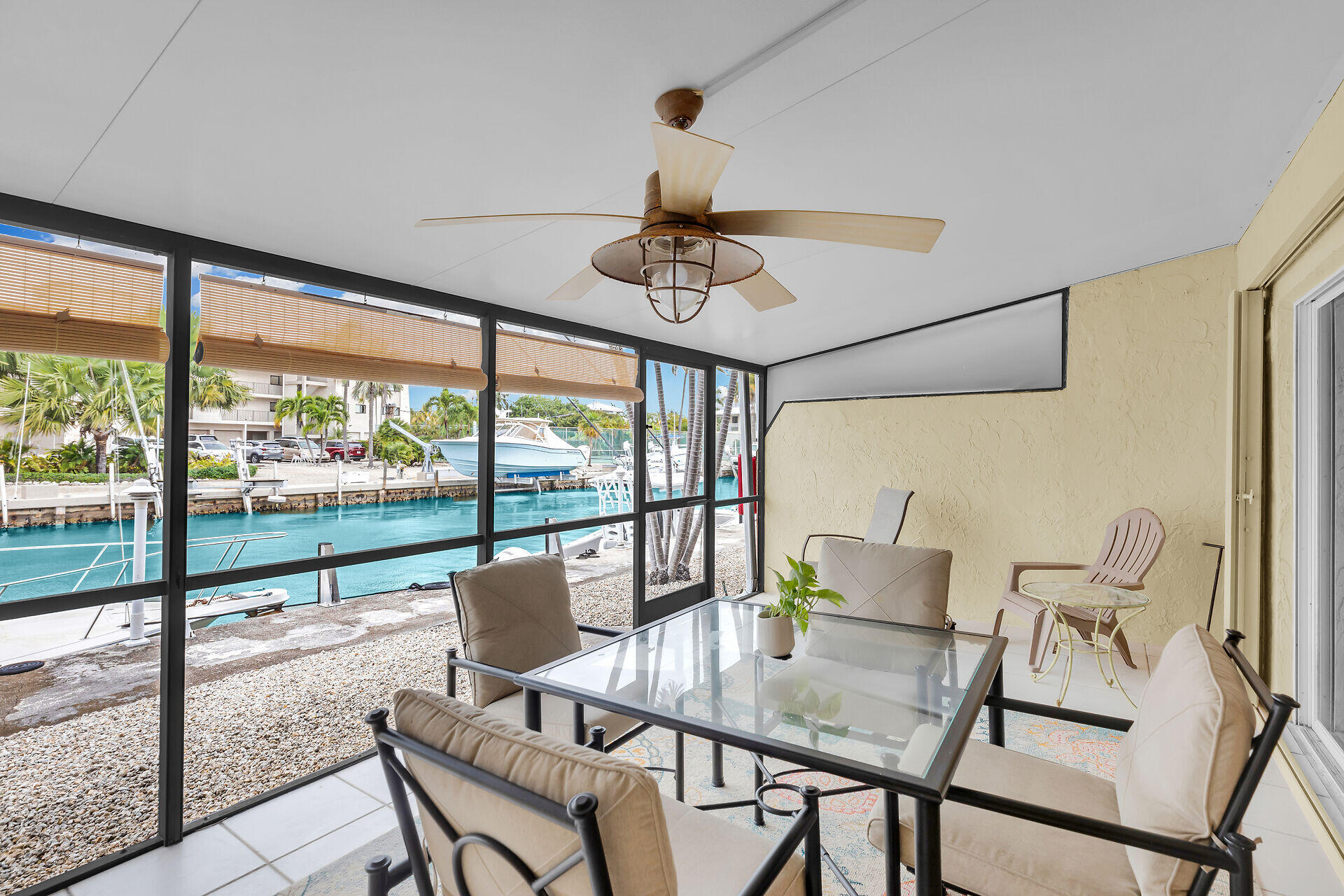 423 Sombrero Beach Road, Unit 9 Marathon, FL 33050 - Photo 3 of 42 Screened Patio with Canal Views