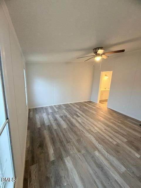1185 Diamond Hills Road Stem, NC 27581 - Photo 7 of 14 wooden floor in an empty room with a window
