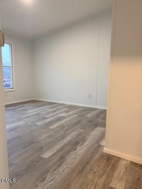 1185 Diamond Hills Road Stem, NC 27581 - Photo 10 of 14 a view of room with wooden floor