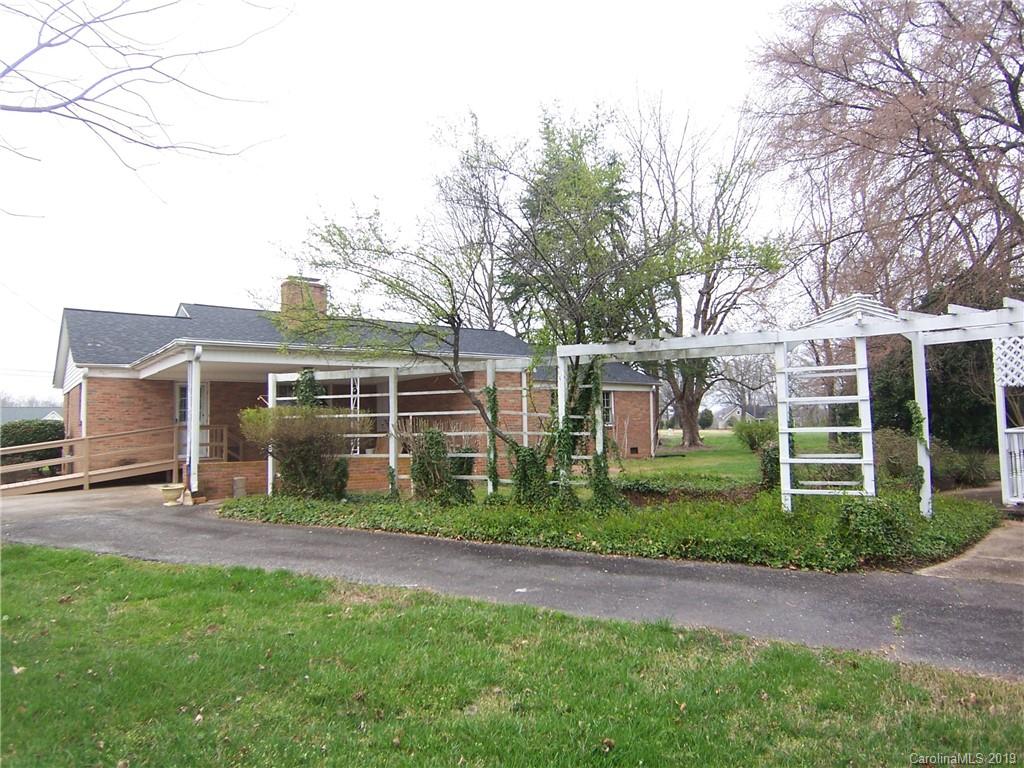 3804 Fallston Road Shelby, NC 28150 - Photo 19 of 24 a front view of a house with a garden