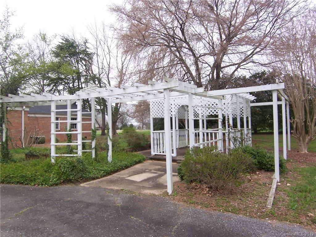 3804 Fallston Road Shelby, NC 28150 - Photo 23 of 24 a view of a house with garden and porch