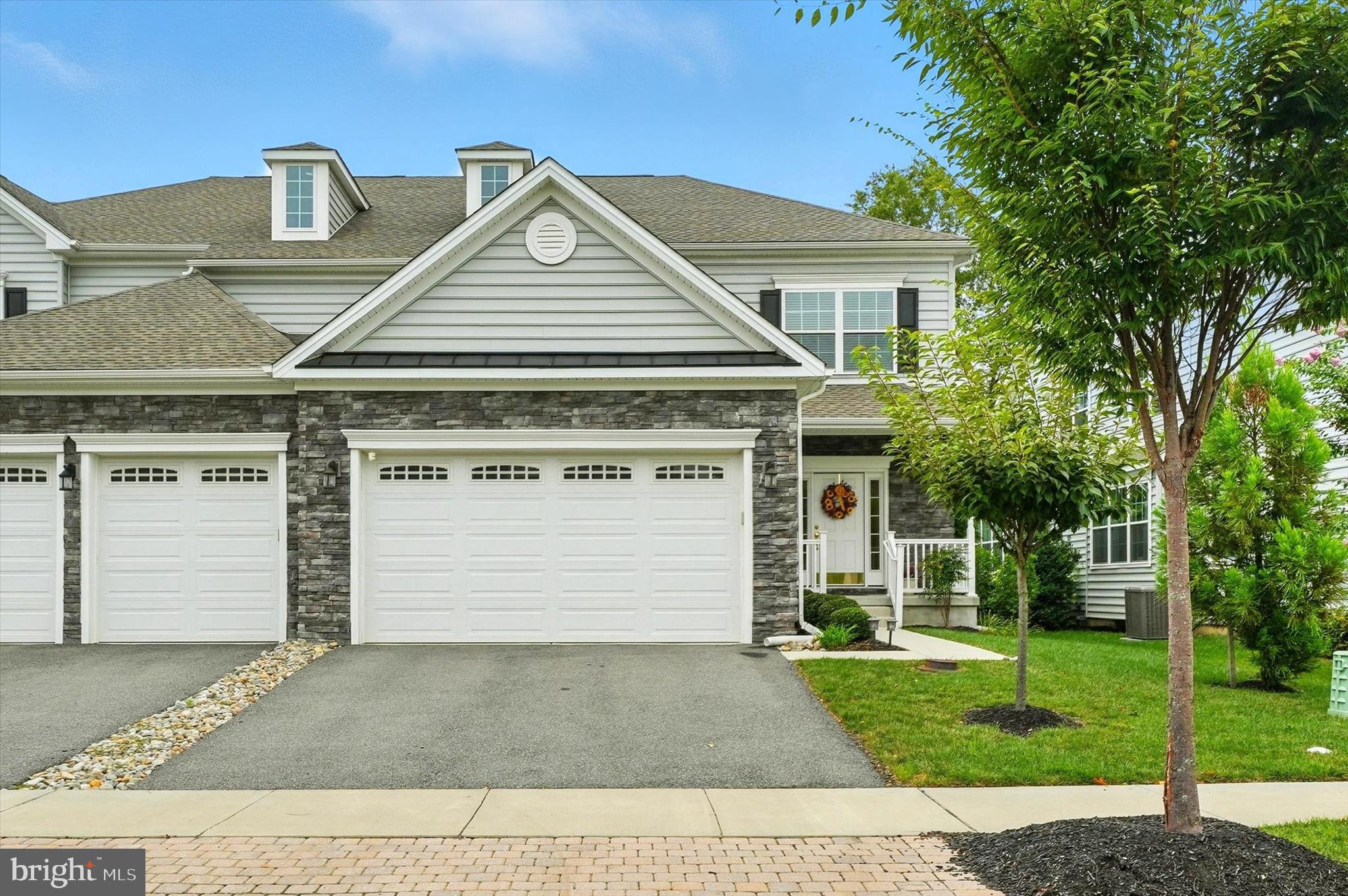 167 Sirius Drive Bear, DE 19701 - Photo 2 of 47 a front view of a house with a yard
