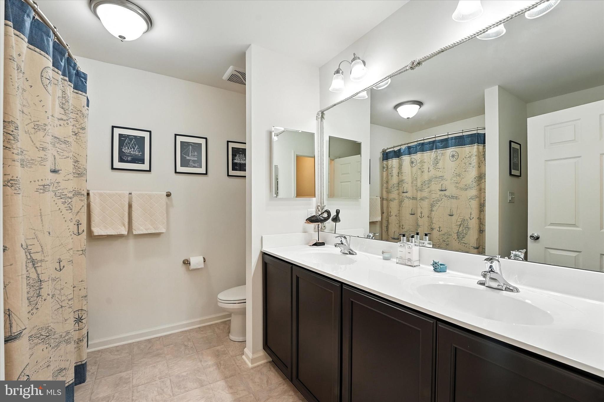 167 Sirius Drive Bear, DE 19701 - Photo 30 of 47 a bathroom with a double vanity sink mirror and toilet