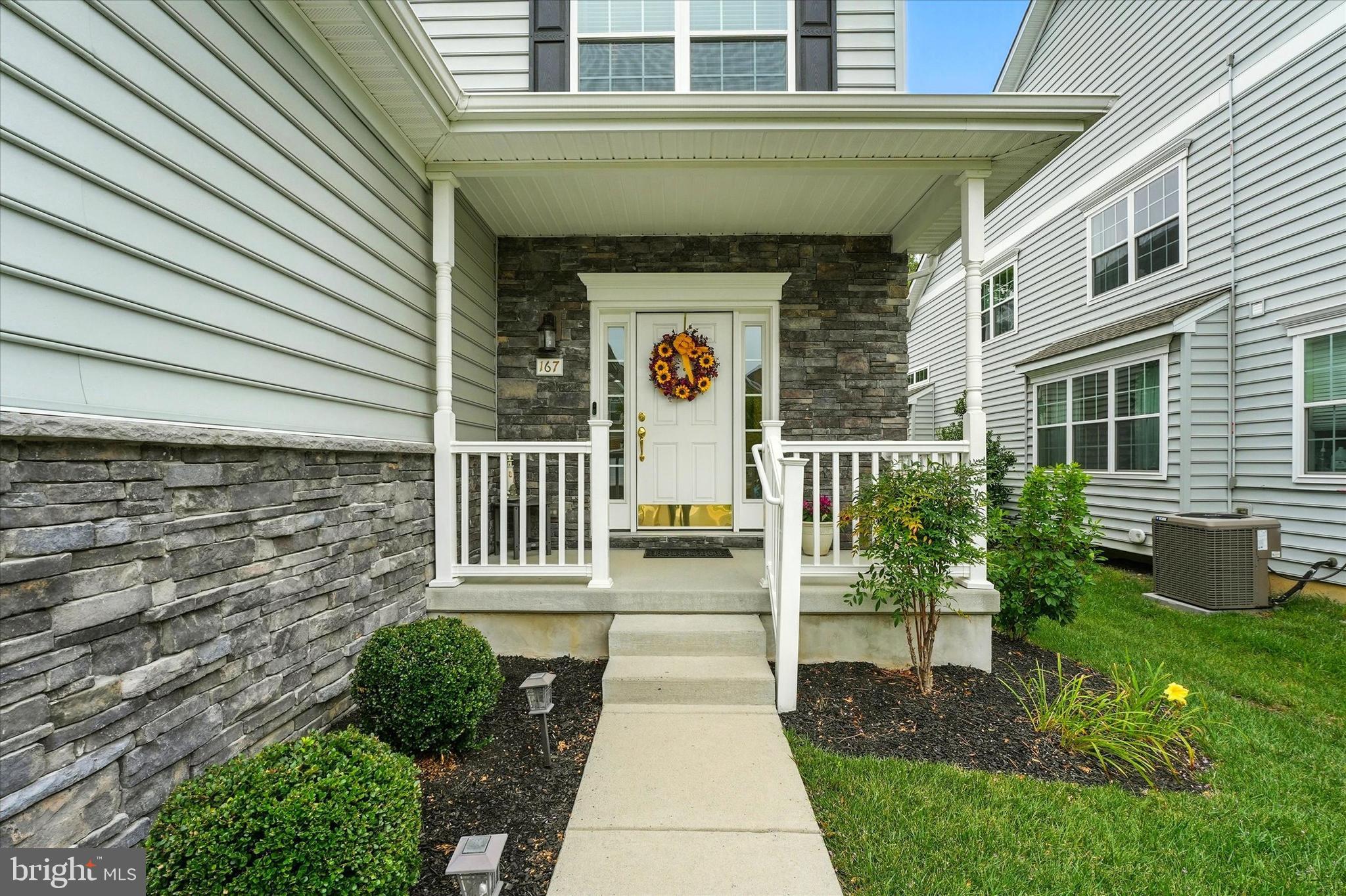 167 Sirius Drive Bear, DE 19701 - Photo 3 of 47 a front view of a house with garden