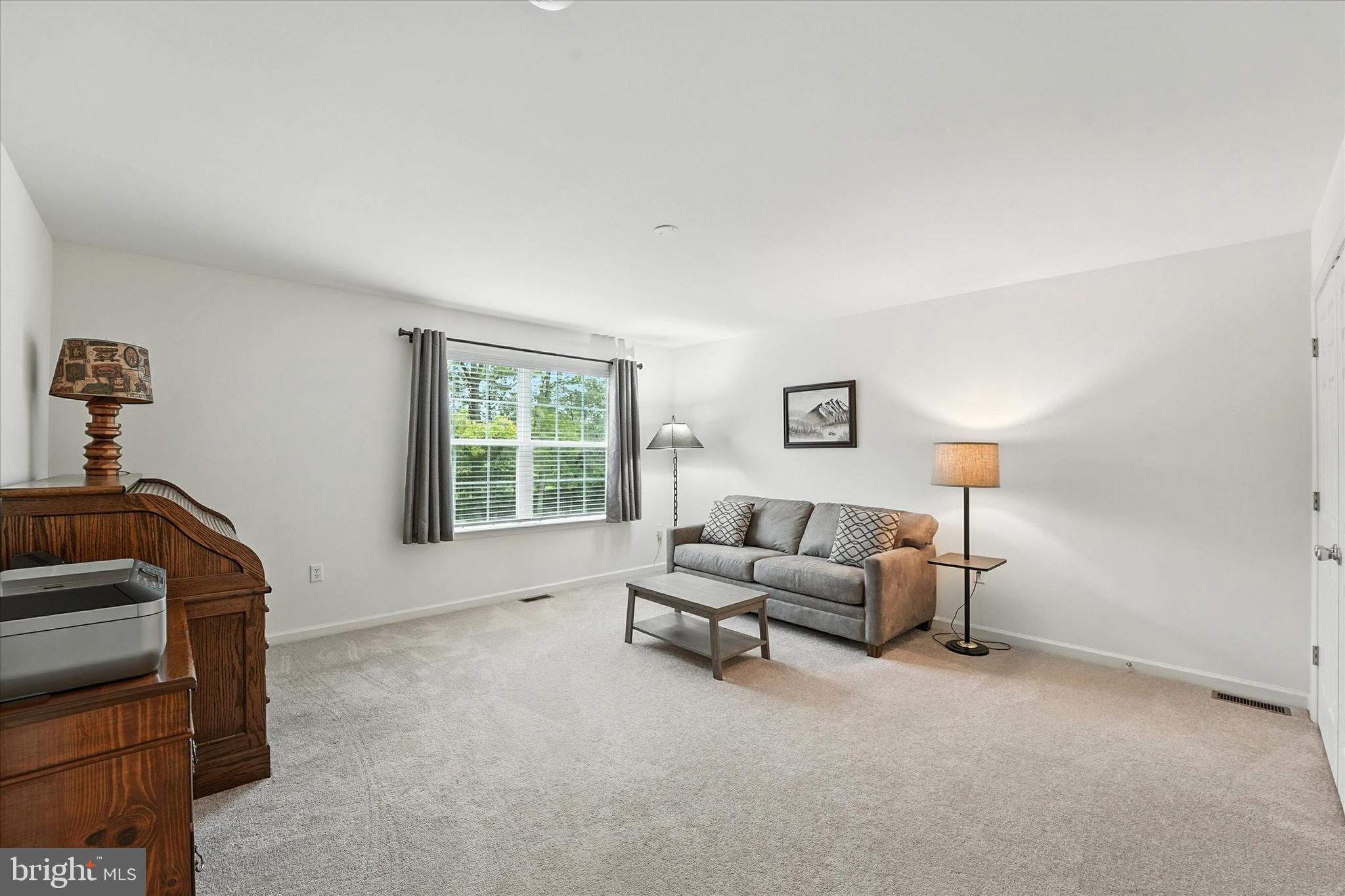 167 Sirius Drive Bear, DE 19701 - Photo 32 of 47 a living room with furniture and a window