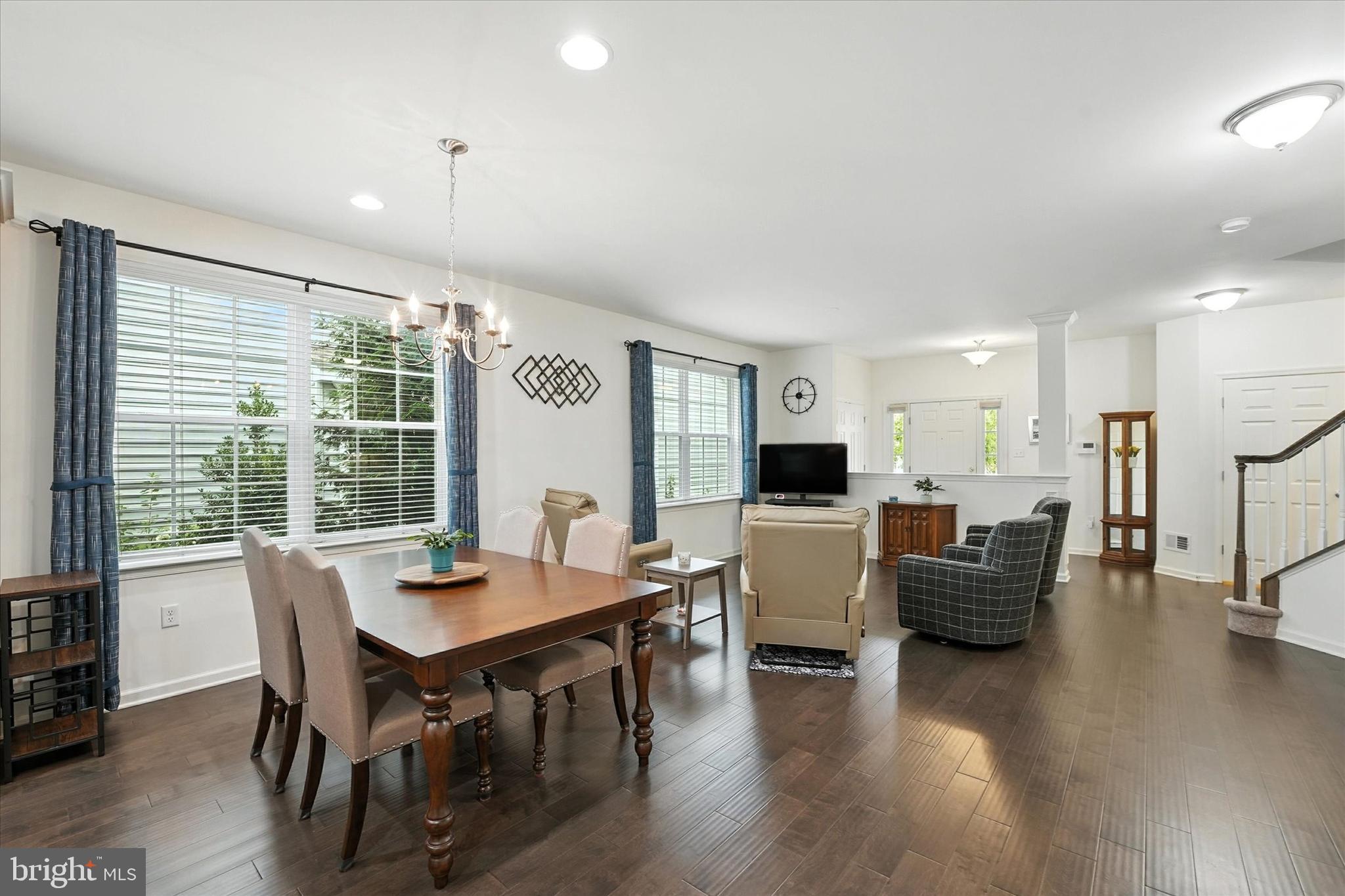 167 Sirius Drive Bear, DE 19701 - Photo 9 of 47 a view of a dining room with furniture and wooden floor