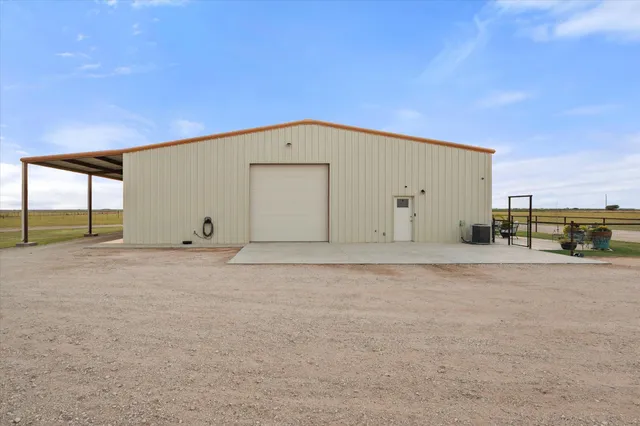 a view of a big room with table and chairs