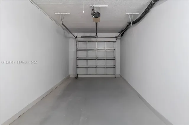 a view of a chairs and table in the balcony