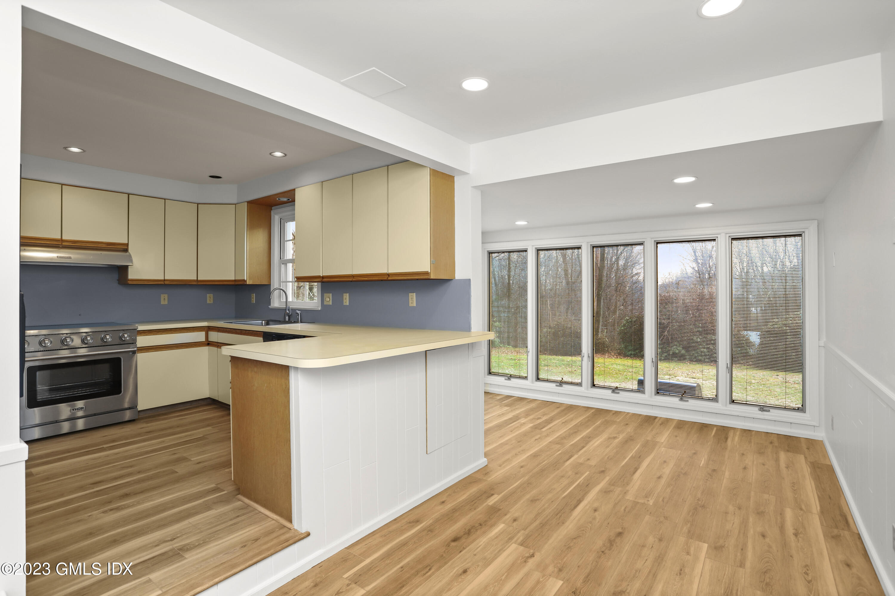 148 Old Mill Road Greenwich, CT 06831 - Photo 22 of 39 KITCHEN AND ADJACENT BREAKFAST/SOLARIUM