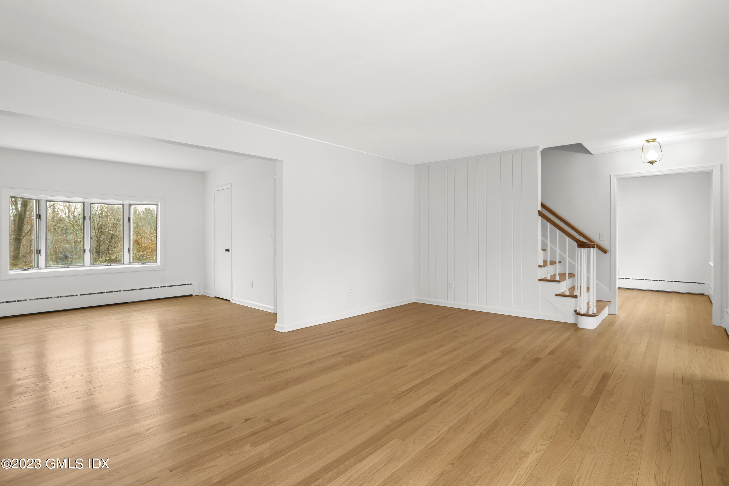 148 Old Mill Road Greenwich, CT 06831 - Photo 10 of 39 LIVING ROOM AND ADJACENT FAMILY ROOM