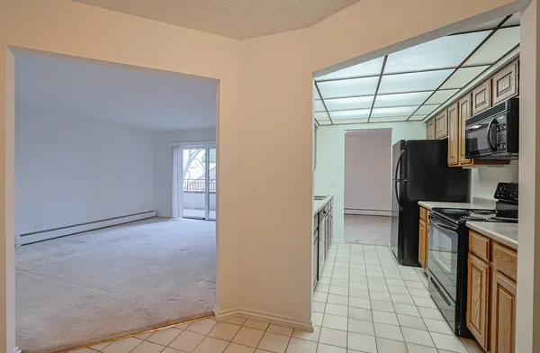 a view of a kitchen with a sink