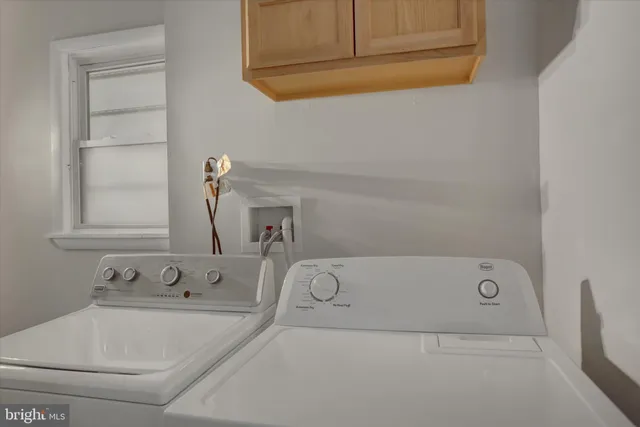 a bathroom with a bathtub and a sink