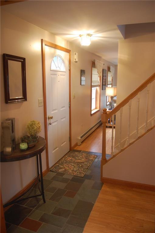 155 South Main Street Morrill, ME 04952 - Photo 14 of 28 The front door entryway connects the...