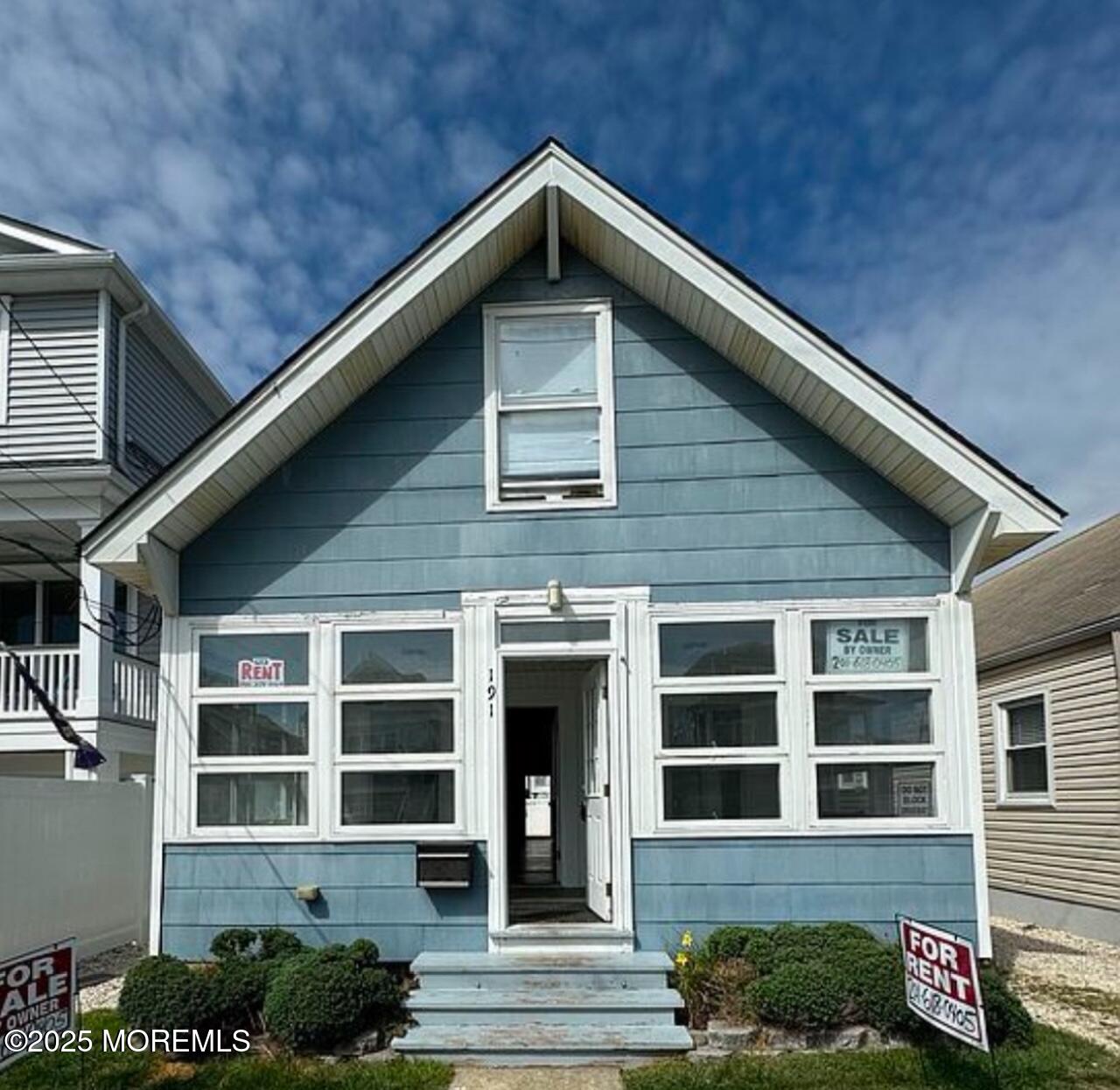 191 3rd Avenue, Unit 1 Manasquan, NJ 08736 - Photo 1 of 13 a front view of a house with an outdoor space