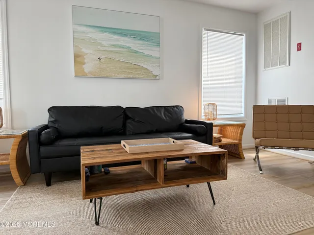 a living room with furniture and a couch