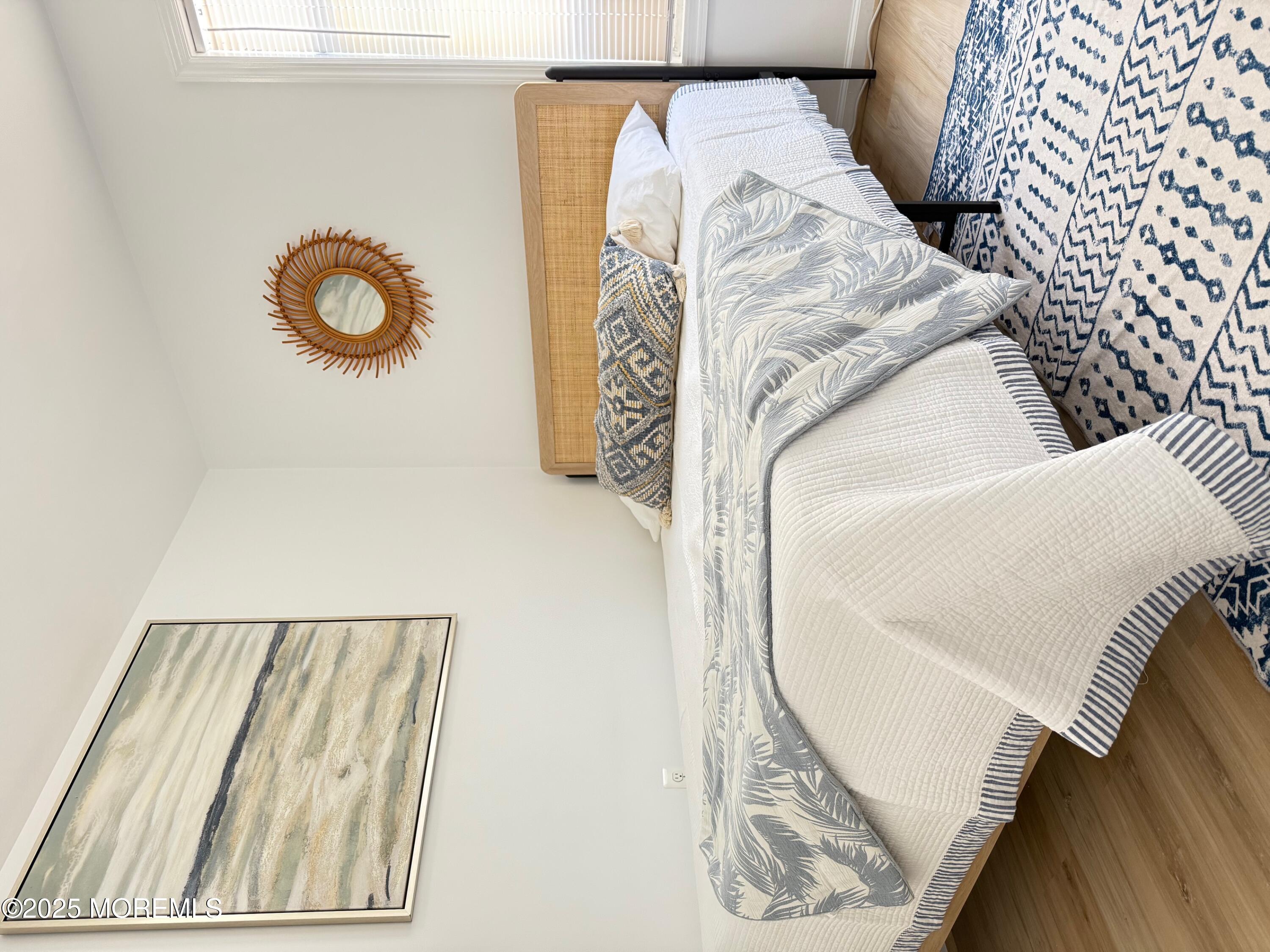 191 3rd Avenue, Unit 1 Manasquan, NJ 08736 - Photo 10 of 13 a view of a living room with a rug