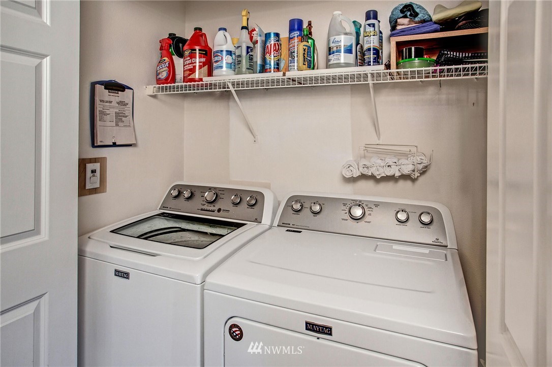 17426 Bothell Way Northeast, Unit A402 Bothell, WA 98011 - Photo 24 of 29 a utility room with dryer and washer