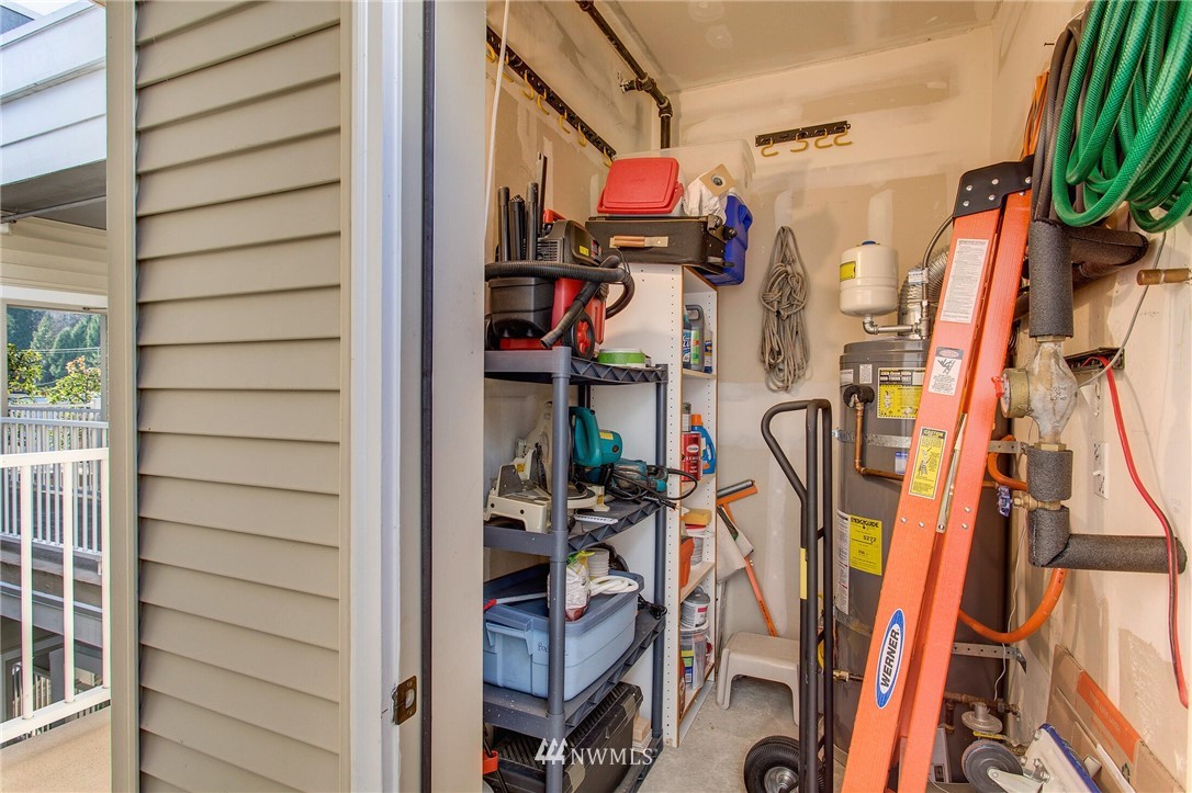 17426 Bothell Way Northeast, Unit A402 Bothell, WA 98011 - Photo 27 of 29 a view of walk in closet with clothes and shoes