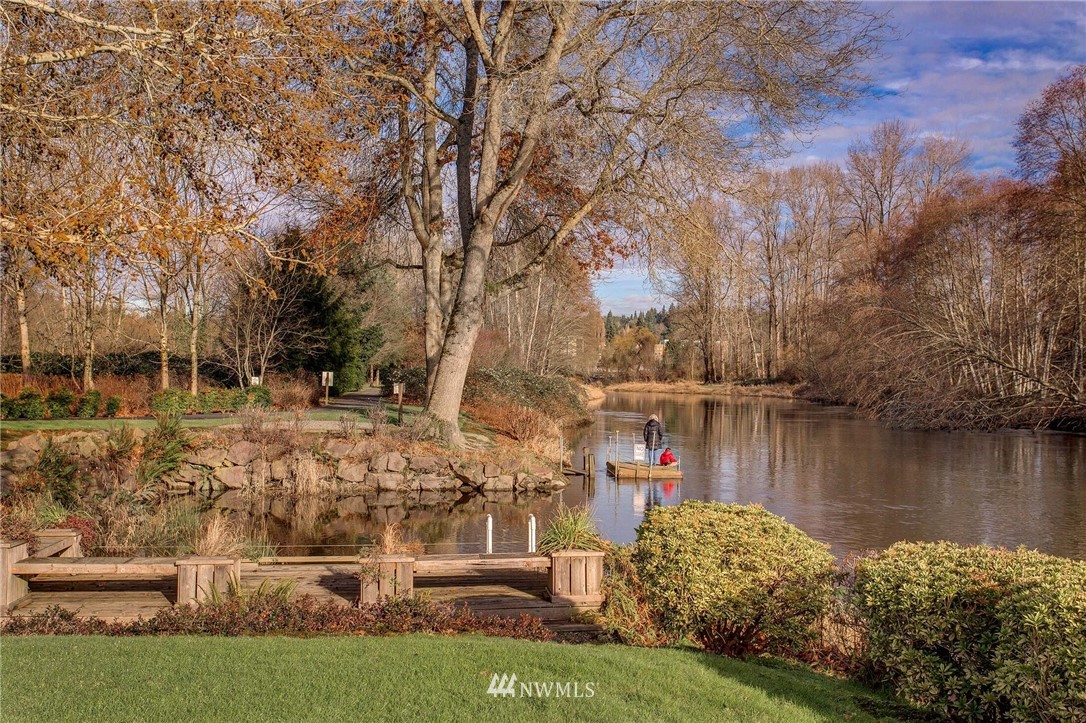 17426 Bothell Way Northeast, Unit A402 Bothell, WA 98011 - Photo 7 of 29 a view of a lake with houses