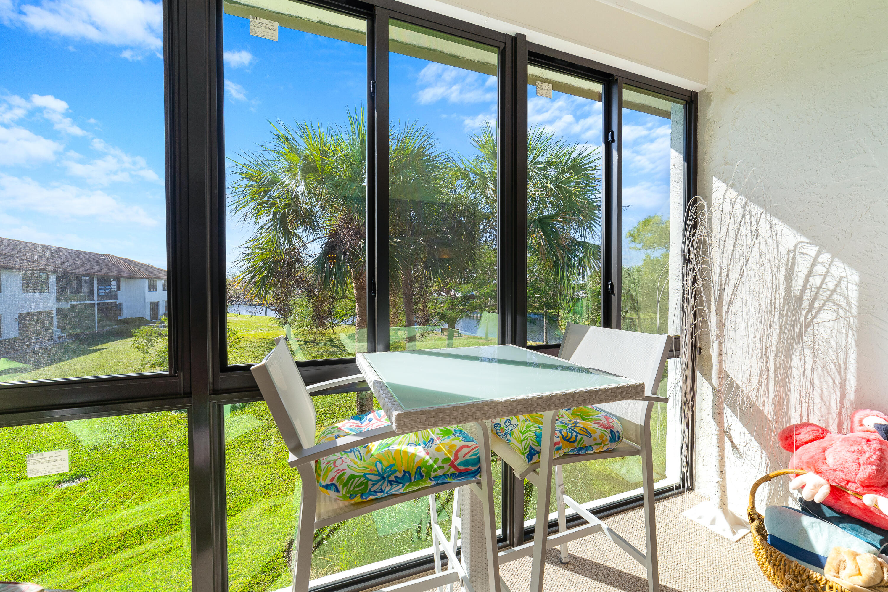 6121 Southeast Landing Way, Unit 12 Stuart, FL 34997 - Photo 11 of 47 a view of an outdoor dining room with furniture