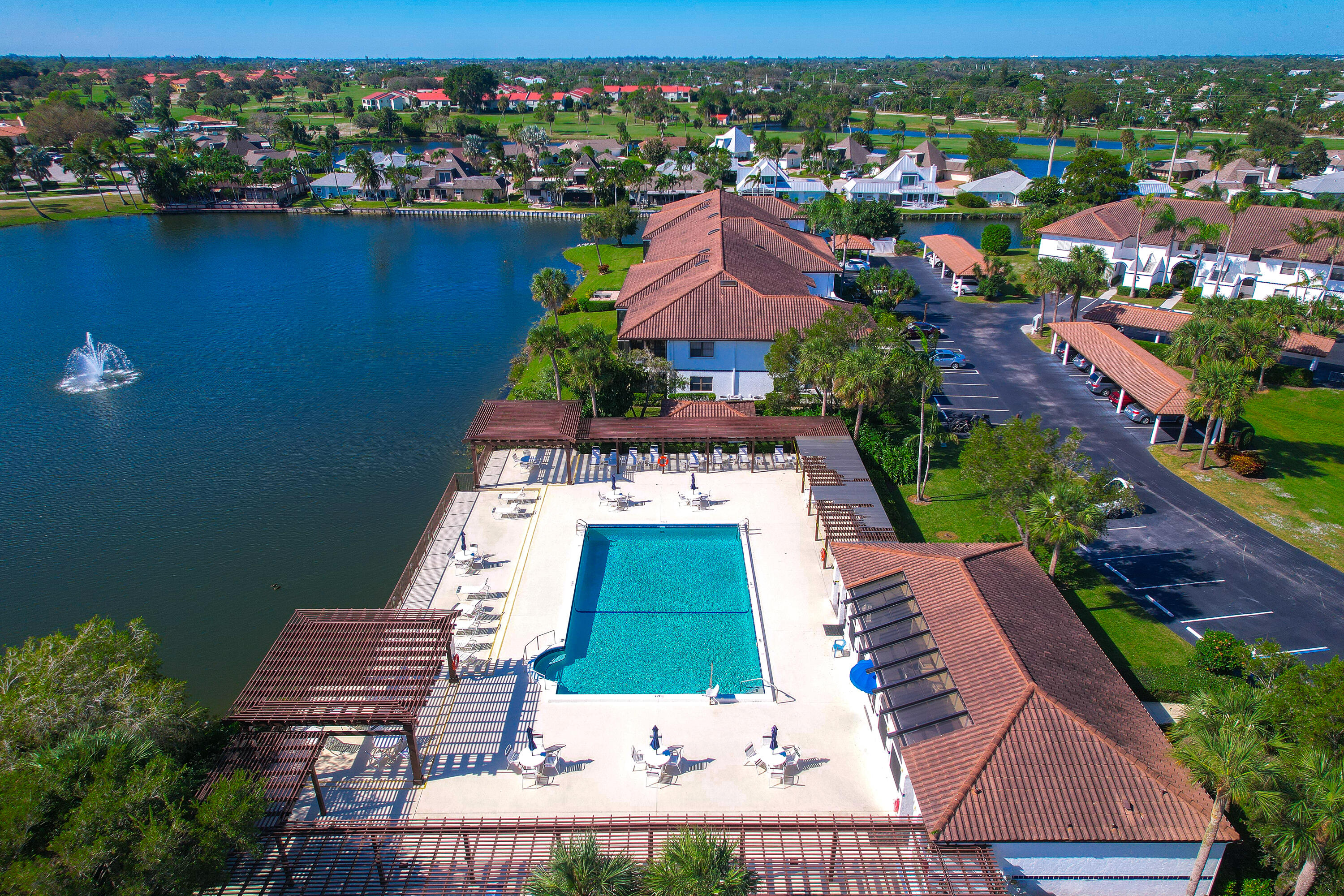 6121 Southeast Landing Way, Unit 12 Stuart, FL 34997 - Photo 37 of 47 an aerial view of a house with a garden