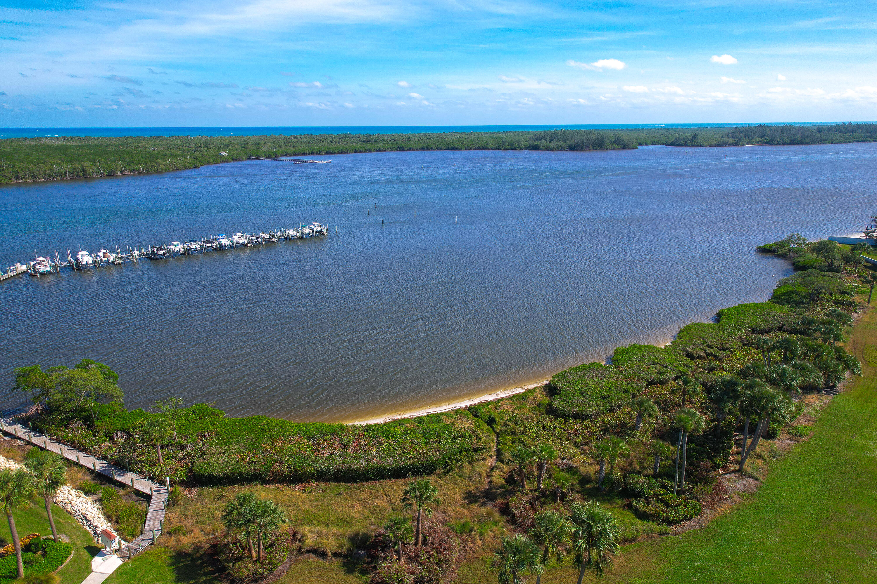 6121 Southeast Landing Way, Unit 12 Stuart, FL 34997 - Photo 46 of 47 a view of a lake