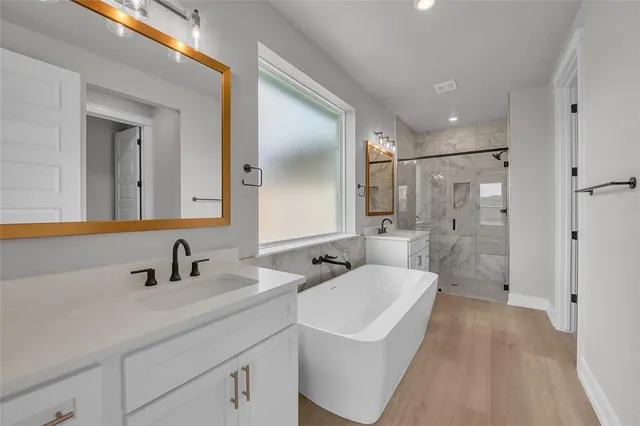 an empty room with closet and a ceiling fan