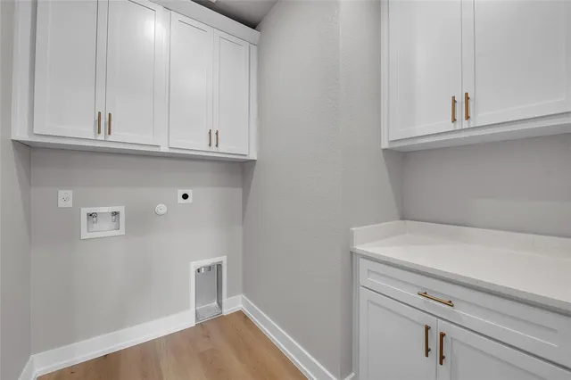 a bathroom with a double vanity sink toilet mirror and shower