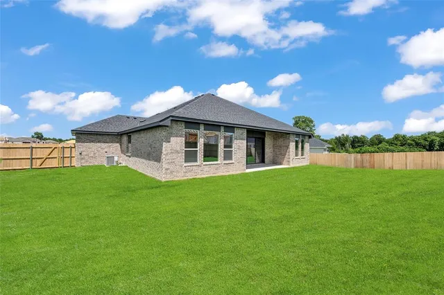 a view of a backyard with a garden