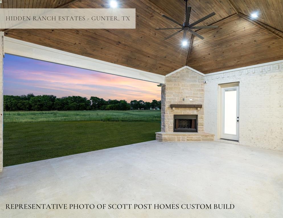 Tbd Lot 9 Tbd Van Alstyne, TX 75495 - Photo 14 of 19 a view of a big room with balcony and fireplace