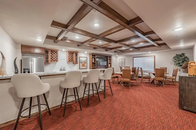 a view of a livingroom with furniture and a wooden floor