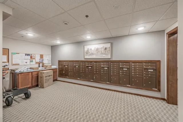 a view of an empty room with a fireplace