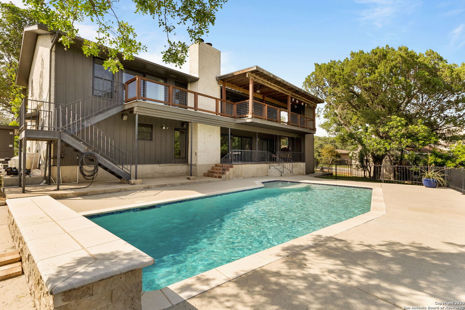835 Fredericksburg Road New Braunfels, TX 78130 - Photo 1 of 56 a front view of a house with a yard